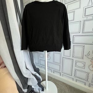 Black, fine-gauge knit sweater